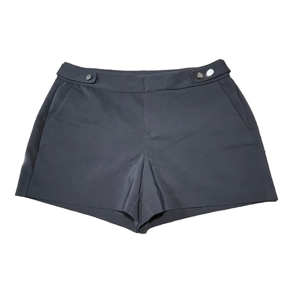 ELLE, BLACK POLISHED SHORTS WITH SILVER BUTTON DETAIL AT WAIST. SIZE 8 - Picture 1 of 6